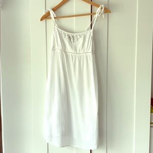 Aritzia. White lace adjustable tie strap dress